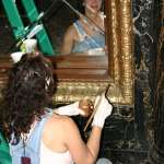 The Saenger Theater Restorative Artist Touches up Some Gilt Paint