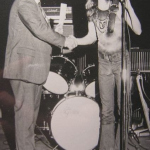 Berry donates a check to the Macon Jaycees circa 71/72
