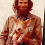 This is the photo the AJC used that so many have likened to the Geico caveman. I was working on a hog farm and the shot was taken at the end of a blustery day.