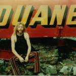 Duane With "Duane" Sign