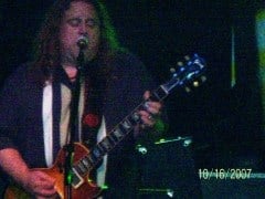 Warren  on stage